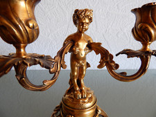 Zwei Kerzenleuchter mit Faunen